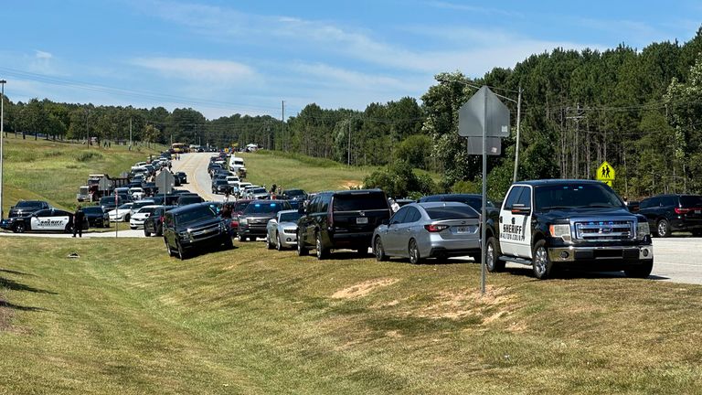 Officers at Apalachee High School. Pic: AP Photo/Jeff Amy