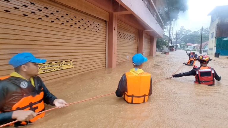 Rescuers work amidst flooding following the impact of Typhoon Yagi in Chiang Rai province, Thailand, September 11, 2024, in this still image taken from a video. Tubjaotak Task Force, Pha Muang Force/Handout via REUTERS THIS IMAGE HAS BEEN SUPPLIED BY A THIRD PARTY