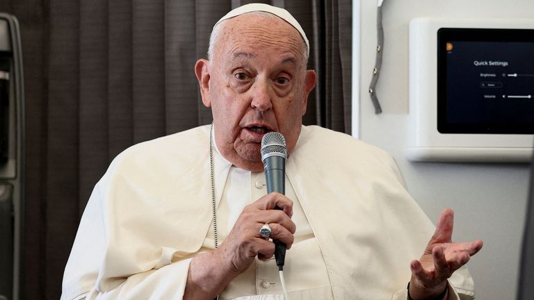 Pope Francis holds a news conference aboard the papal plane after his 12-day tour across Southeast Asia and Oceania. Pic: Reuters