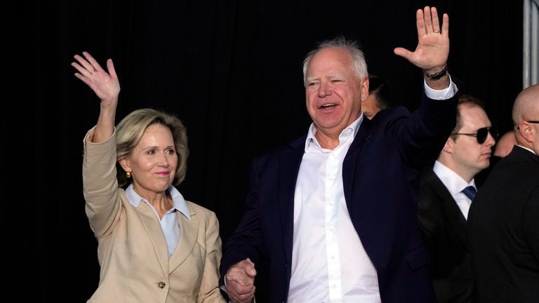 Democratic vice presidential nominee Minnesota Gov. Tim Walz and his wife Gwen arrive for a campaign stop at Laborfest Monday, Sept. 2, 2024, in Milwaukee. (AP Photo/Morry Gash)