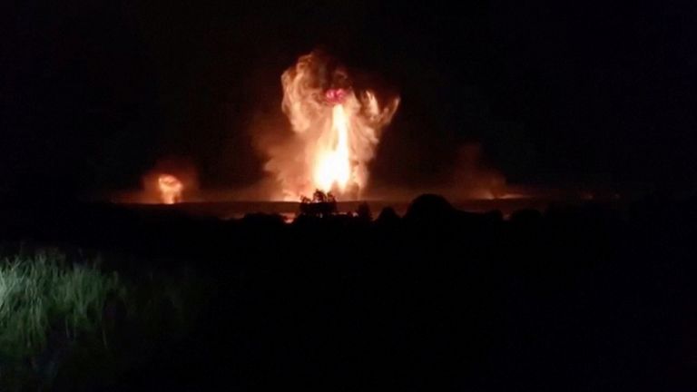 A mushroom cloud rises after the drone strike on Toropets in the Tver region. Pic: Reuters