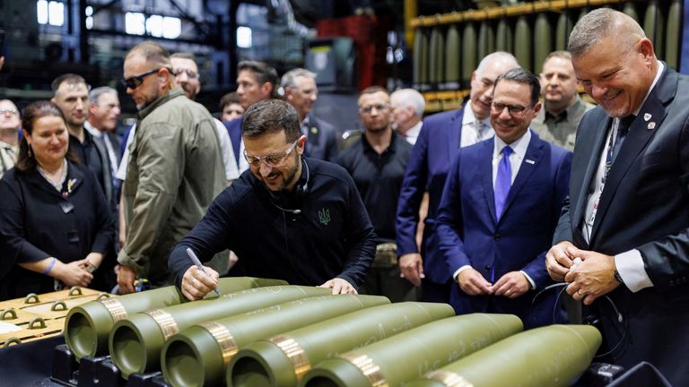 Volodymyr Zelenskyy during his visit to the munitions plant. Pic: Reuters