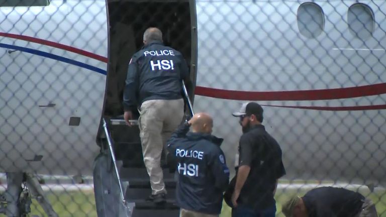 US officials board the plane. Photo: Enex