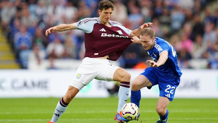 Aston Villa's Pau Torres (left) is tackled by Leicester City's Oliver Skipp (right) during the Premier League match at the King Power Stadium, Leicester. Picture date: Saturday August 31, 2024. PA Photo. See PA story SOCCER Leicester. Photo credit should read: David Davies/PA Wire...RESTRICTIONS: EDITORIAL USE ONLY No use with unauthorised audio, video, data, fixture lists, club/league logos or "live" services. Online in-match use limited to 120 images, no video emulation. No use in betting, games or single club/league/player publications.