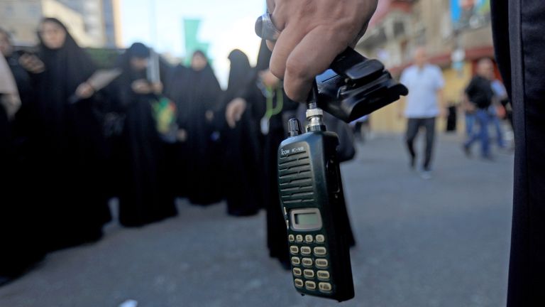 Pic: Xinhua/Shutterstock 
Photo taken on Sept. 18, 2024 shows a wireless communication device in the hand of a Hezbollah member, the battery of which was removed after a wireless communication device exploded during a funeral, in Beirut, Lebanon. The death toll in explosions of wireless communication devices across Lebanon on Wednesday rose to 14, with injuries up to 450, said the Lebanese Health Ministry..Lebanon Communication Devices Explosions - 18 Sep 2024