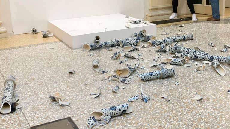 This photo released by OperaLaboratori Tuesday, Sept. 24, 2024 shows the artwork Porcelain Cube by artist Ai Wei Wei destroyed by a Czech man on the day of the opening of the exhibition 'Ai Weiwei, Who am I?", at Palazzo Fava in Bologna, Italy, Friday, Sept. 20, 2024. (OperaLaboratori via AP)