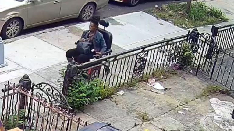 Police have released CCTV video in the search for a woman they say stole an electric wheelchair.