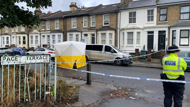 A Metropolitan police officer stands near a police cordon and forensic tent on Paget Terrace, near the scene in Eglinton Road, Woolwich, south-east London, where a teenage boy was stabbed to death on Sunday. Picture date: Monday September 23, 2024.