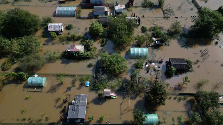 General view taken by drone of flooded allotment gardens by Bystrzyca river in Wroclaw, Poland, September 18, 2024. REUTERS/Kacper Pempel