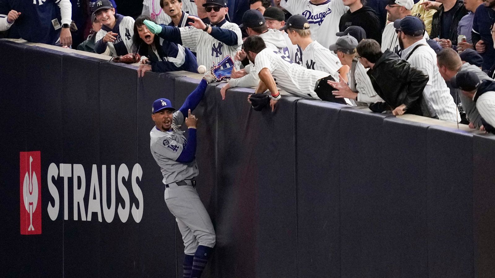 New York Yankees fans who interfered with catch and grabbed Los Angeles