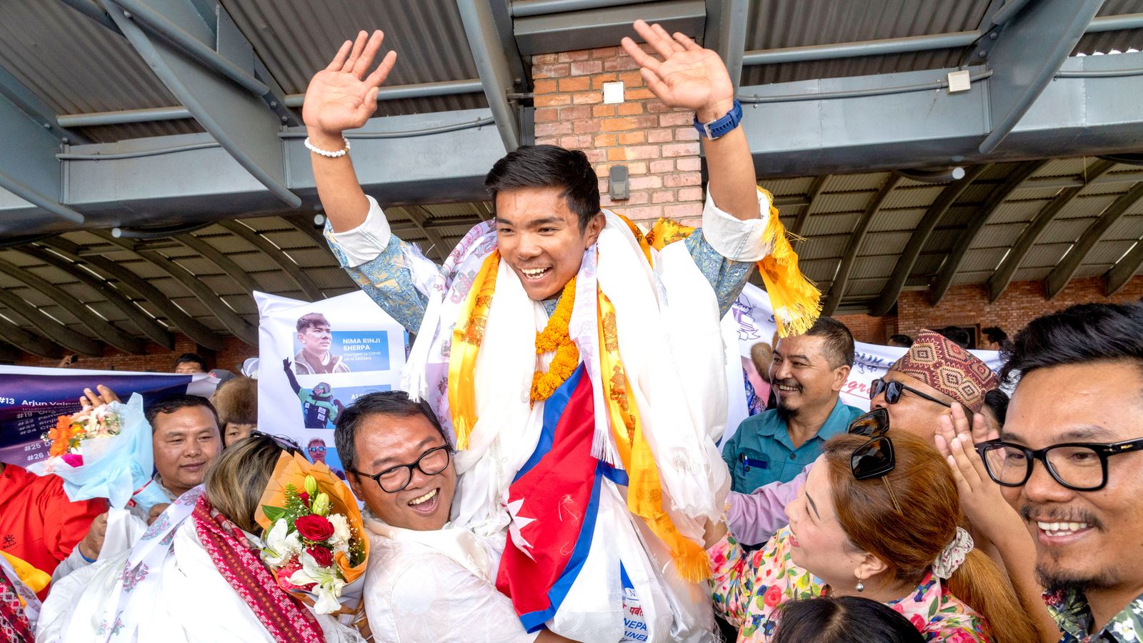 Hero’s welcome for record-breaking Nepal teenager after climbing world’s highest peaks