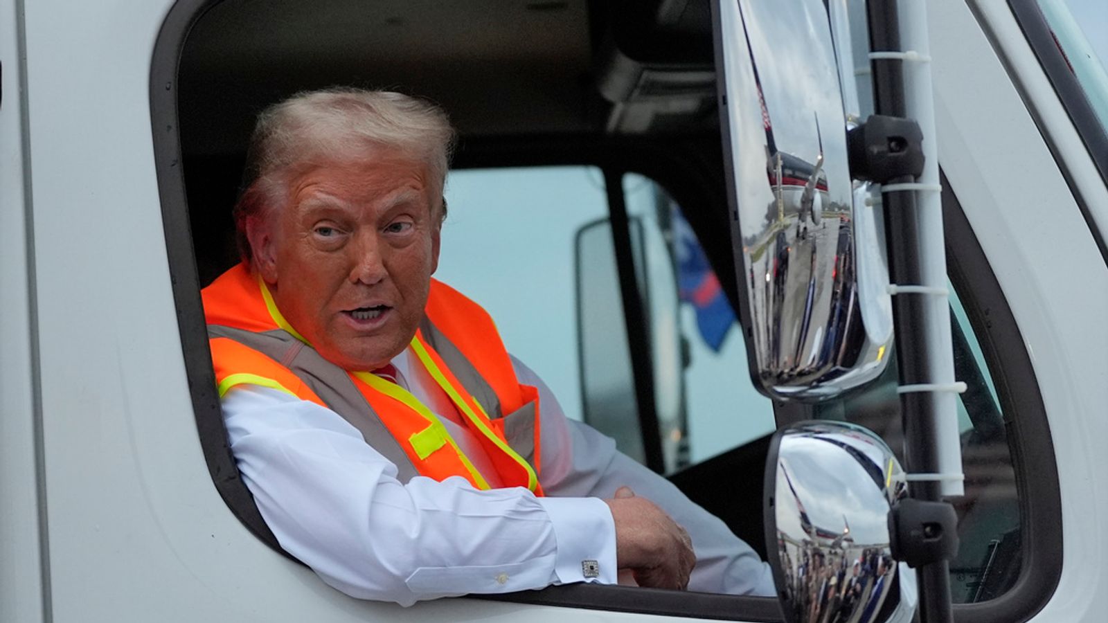 Donald Trump speaks from garbage truck after landing in swing state in jab at Joe Biden