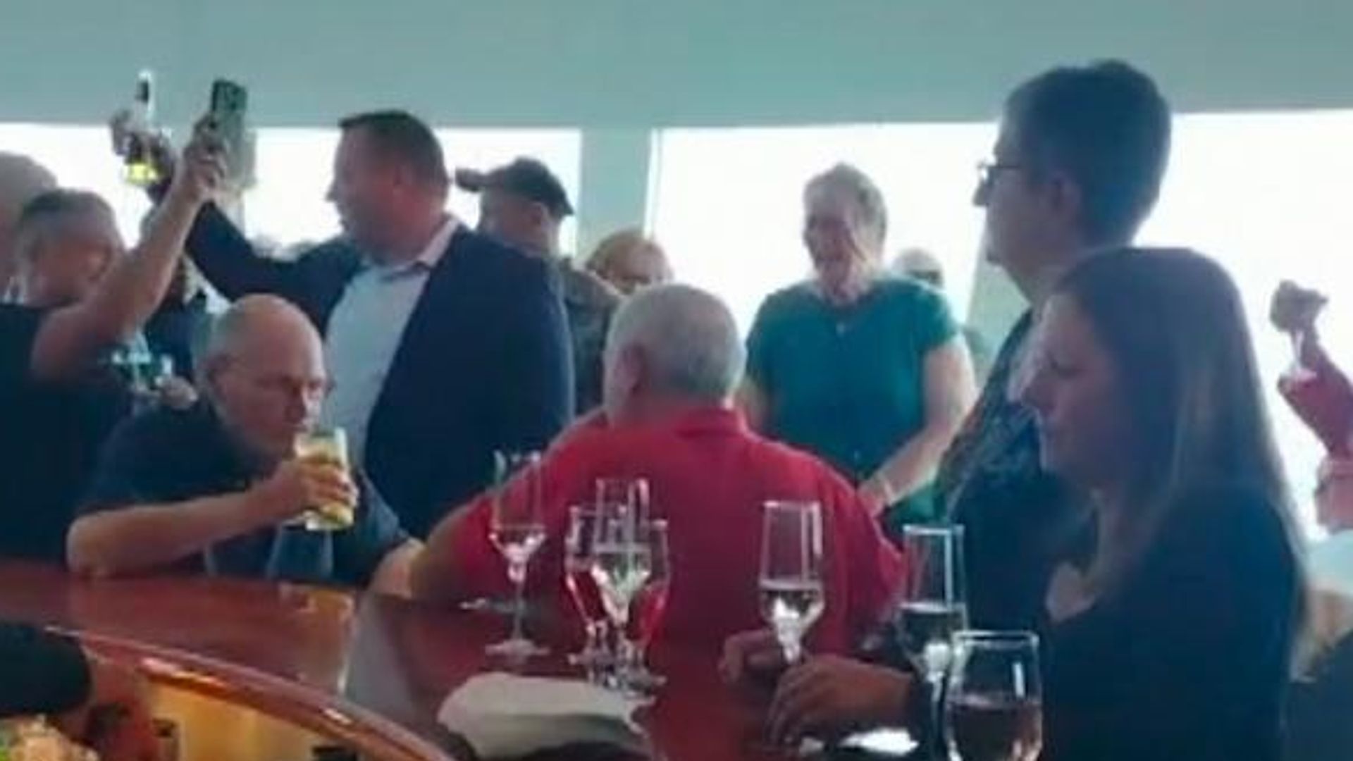 Passengers celebrate as luxury cruise ship stranded for months off Belfast finally sets sail