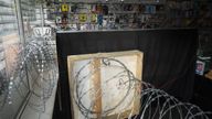 Mr Akhtar spends about 40 minutes a day unrolling the razor wire 