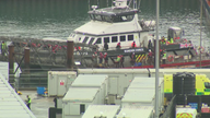 A border force boat docks in Dover on Saturday morning