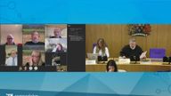 Priest joins virtual council meeting while driving to funeral