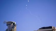 Israel's Iron Dome anti-missile system fires to intercept as air raid sirens sound in Tel Aviv, Wednesday, Oct. 23, 2024. (Nathan Howard/Pool Photo via AP)