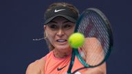 Paula Badosa of Spain returns a shot to Rebecca Sramkova of Slovakia during their women's singles match of the China Open tennis tournament, at the National Tennis Center in Beijing, Sunday, Sept. 29, 2024. (AP Photo/Andy Wong)