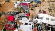 Flooded cars piled up in Valencia, Spain. Pic: AP