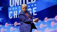 Republican presidential nominee and former U.S. President Donald Trump gestures at a campaign event sponsored by conservative group Turning Point Action, in Las Vegas, Nevada, U.S. October 24, 2024. REUTERS/Carlos Barria
