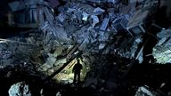 A police officer works at the site of a Russian missile strike, amid Russia's attack on Ukraine, in Kryvyi Rih, Ukraine, in this handout picture released October 20, 2024. National Police/Handout via REUTERS ATTENTION EDITORS - THIS IMAGE HAS BEEN SUPPLIED BY A THIRD PARTY.
