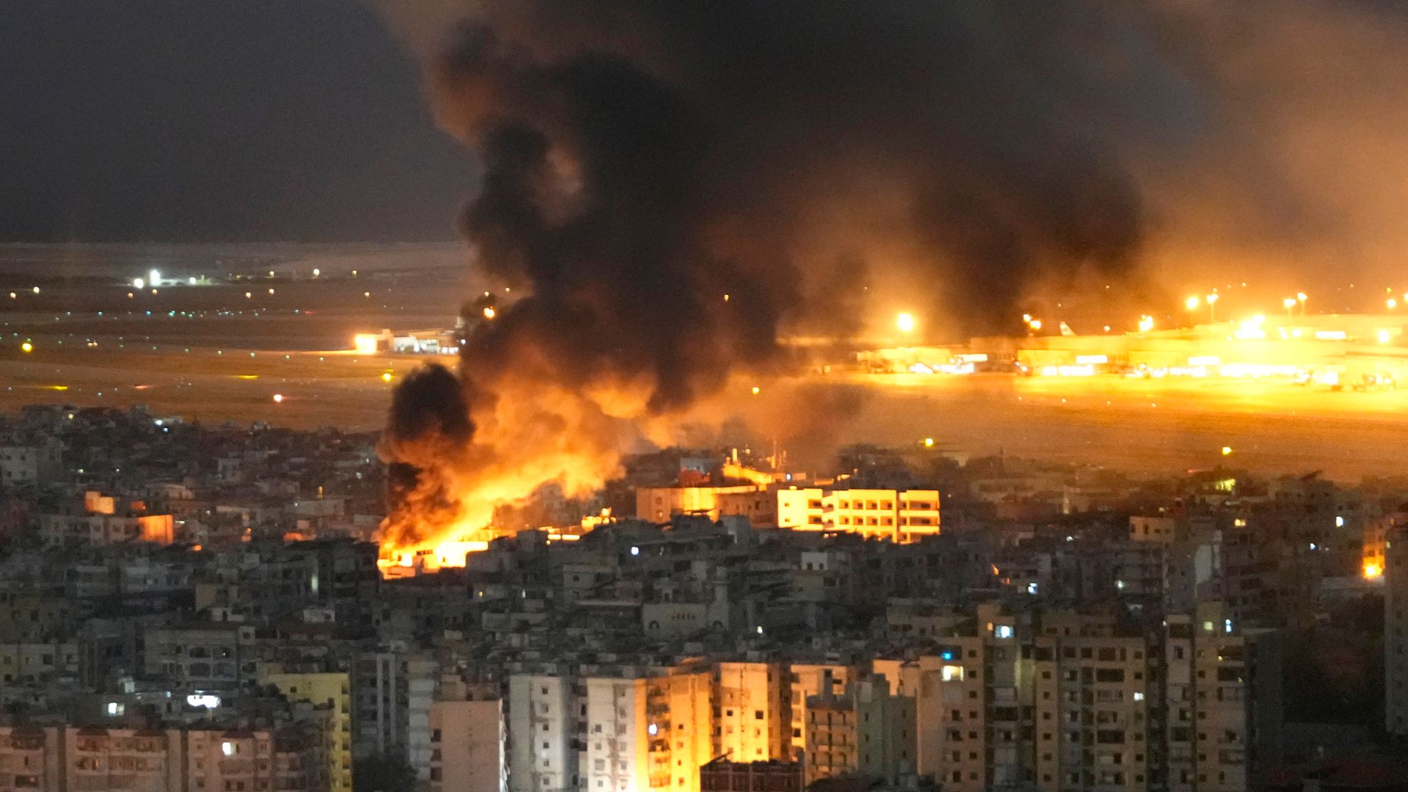 Panicked crowds flee as Israel bombs branches of bank in Lebanon