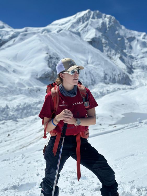 Adriana Brownlee, 23, the youngest female mountaineer to climb the world's fourteen highest peaks. At the summit of Shishapangma. Pic: Aga Adventures