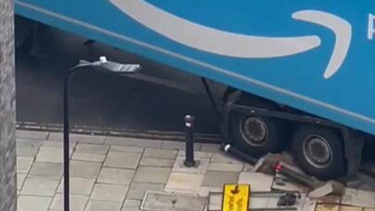 The footage of a lorry driver crashing bollards was filmed by a resident in Ealing, west London.