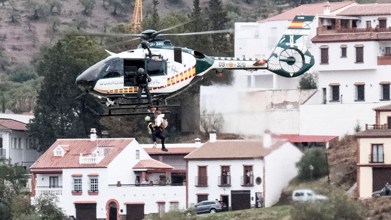 Emergency teams rescue a idiosyncratic   who was stranded by the h2o  successful  a Guardia Civil helicopter, aft  the floods preceded by dense  rains that caused the overflow of the stream  successful  the municipality  of Alora, Malaga, Spain, Tuesday, Oct. 29, 2024. (AP Photo/Gregorio Marrero)