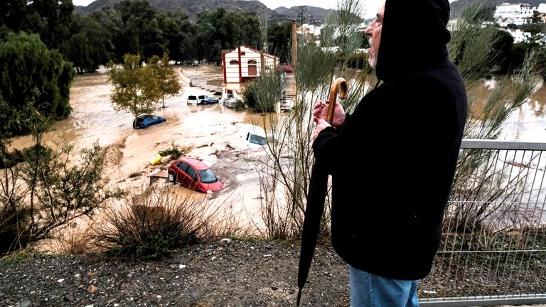 A antheral   observes respective  cars being swept distant  by the water, aft  floods preceded by dense  rains caused the stream  to overflow its banks successful  the municipality  of Alora, Malaga, Tuesday, Oct. 29, 2024. (AP Photo/Gregorio Marrero)