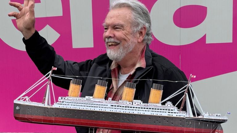 Andy Garrison with his model version of the Titanic