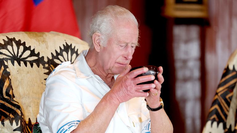 King Charles is presented with an 'Ava drink .
Pic: PA