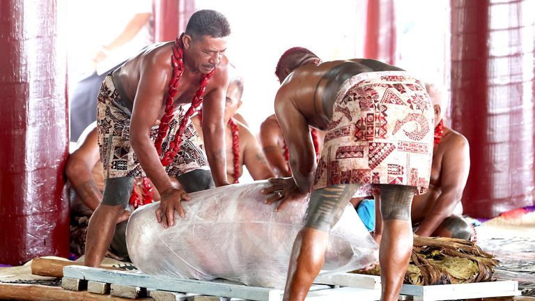 Members of the Falelatai village participate in an 'ava ceremony, reserved only for monarchs, hosted by the Samoan Head of State and his village for King Charles III and Queen Camilla, during their visit to the National University of Samoa, on day five of the royal visit to Australia and Samoa. Picture date: Thursday October 24, 2024. PA Photo. See PA story ROYAL Tour. Photo credit should read: Chris Jackson/PA Wire