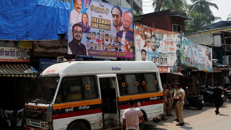 Police stand guard at the crime scene in Mumbai. Pic: Reuters