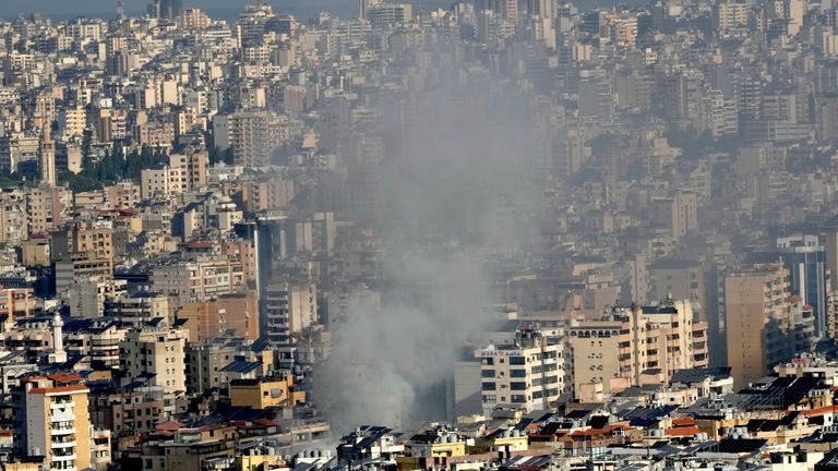 Smoke rises a neighbourhood that was hit by an Israeli airstrike in Dahieh, Beirut.
Pic: AP