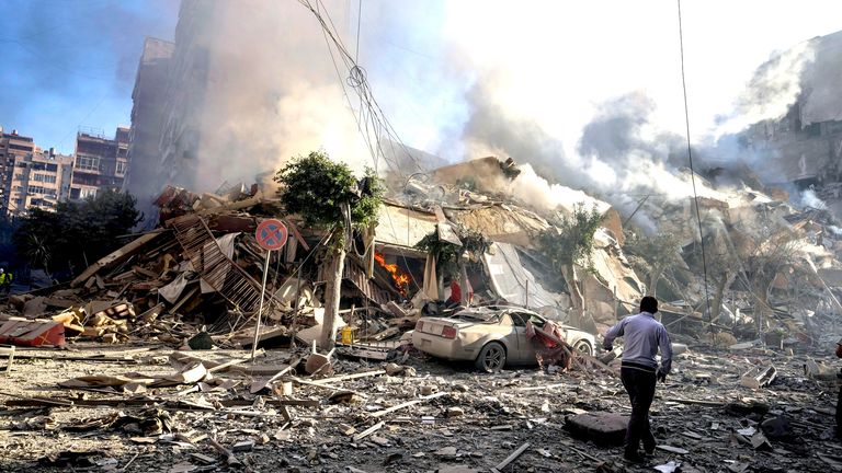 Smoke rises from the site of an Israeli airstrike in Dahiyeh, Beirut.
Pic: AP