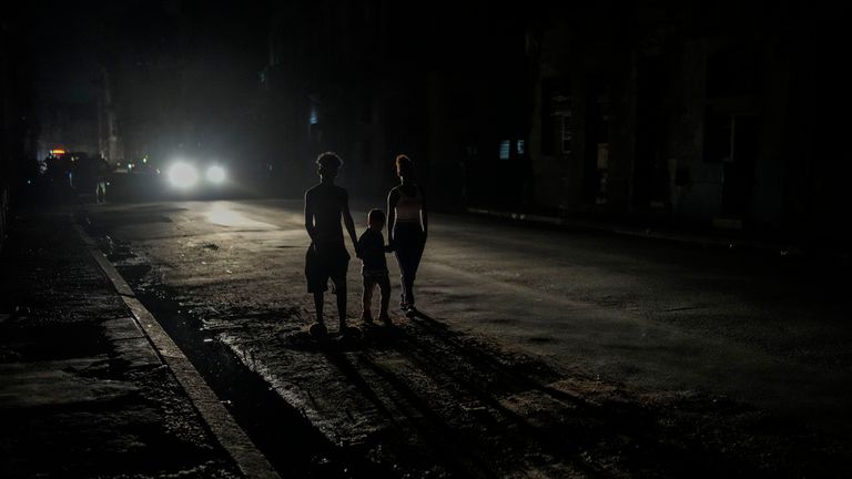 Residents were left in the dark after the initial blackout. Pic: AP