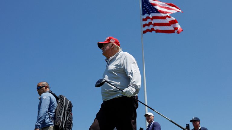 Donald Trump participating in the Pro-Am tournament at the Trump National Golf Club in Sterling, Virginia. Pic: Reuters