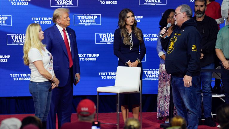 Trump meeting Mary and Charles Strange.
Pic: AP