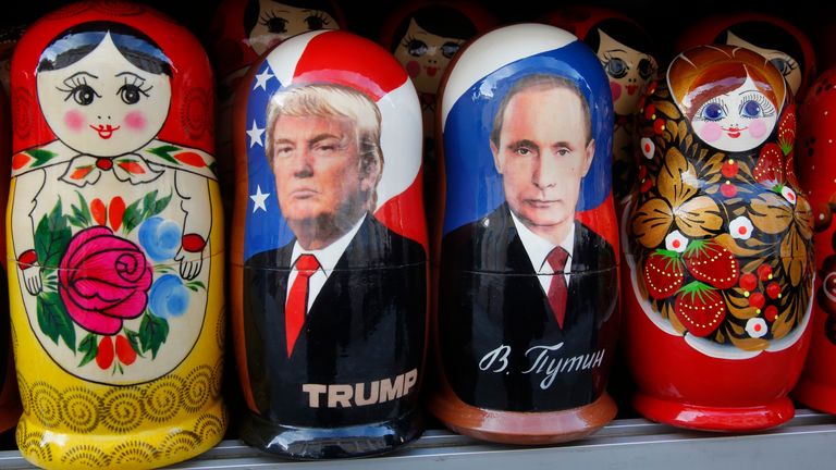 Traditional Russian wooden dolls depicting Putin and Trump during his first term as US President. Pic: AP