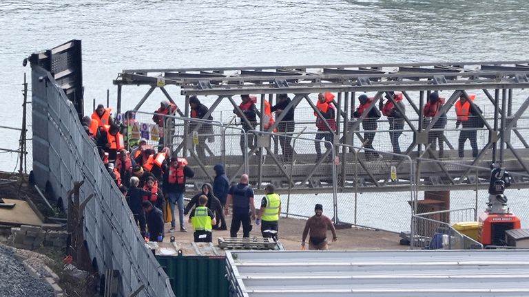 A group of people thought to be migrants are brought in to Dover, Kent, from a Border Force vessel following a small boat incident in the Channel. Picture date: Friday October 4, 2024. PA Photo. See PA story POLITICS Migrants. Photo credit should read: Gareth Fuller/PA Wire 