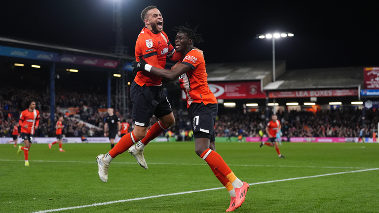 Luton Town's Elijah Adebayo (right) celebrates after his first goal of the season this week. Pic: PA