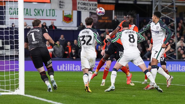 Luton Town's Elijah Adebayo scores the side's first goal of the game during the Sky Bet Championship match at Kenilworth Road. Pic: PA