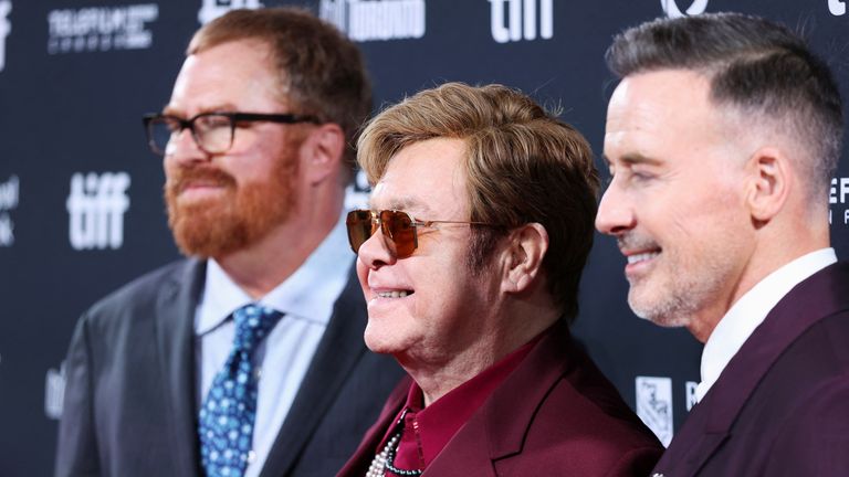 From left: RJ Cutler, Sir Elton John and David Furnish on the red carpet for a screening of the documentary in Toronto. Image: Reuters