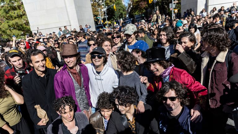 Contestants gather for the Timothee Chalamet lookalike contest in Washington Square Park, Sunday, Oct. 27, 2024, in New York. (AP Photo/Stefan Jeremiah)