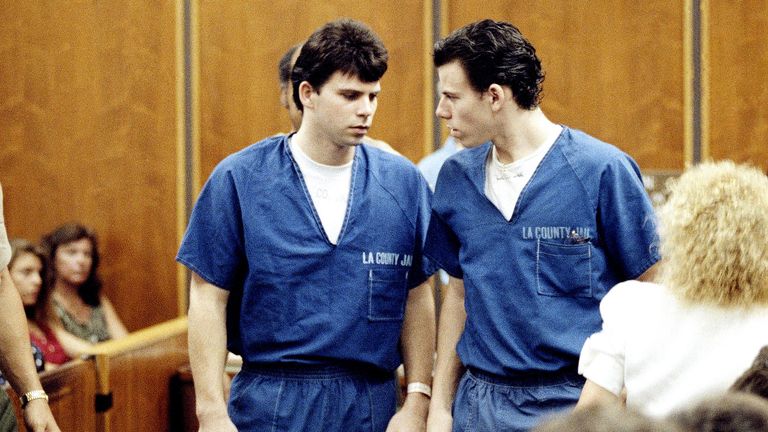 Lyle, left, and Erik Menendez leave courtroom in Santa Monica, Calif., Aug. 6, 1990, after a judge ruled that conversations between the two brothers and their psychologist after their parents were slain are not privileged and can be used as evidence in their murder case. (AP Photo/Nick Ut)