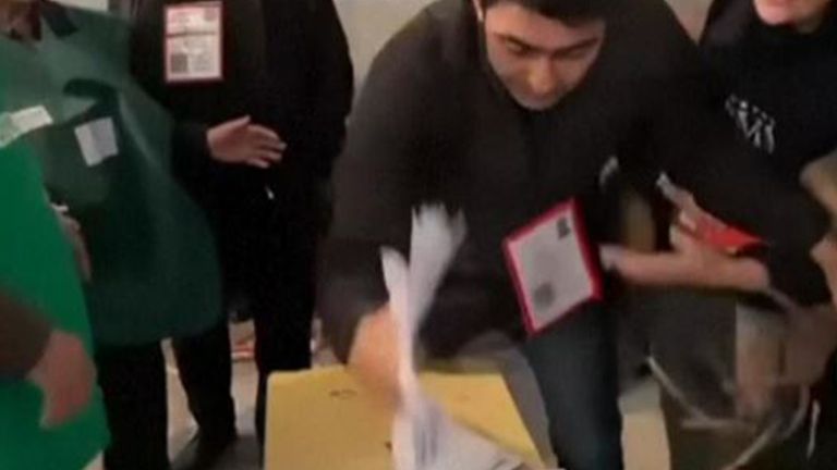 A video shared on social media showed a man stuffing ballots into a box at a polling station in Marneuli