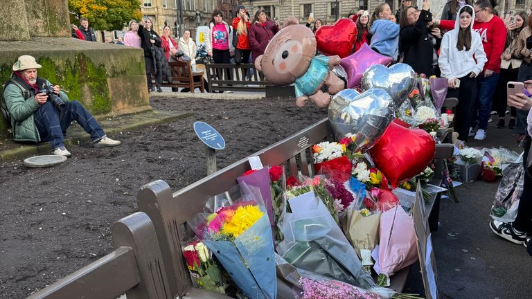 Flowers and balloons at the Glasgow vigil. Pic: PA