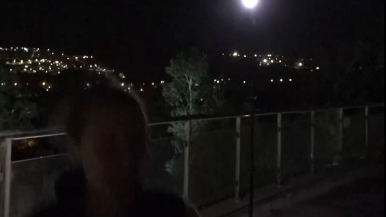 Deborah Haynes runs for safety as missiles fly overhead