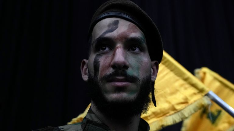 A Hezbollah fighter attends a rally to mark Jerusalem day or Al-Quds day, in a southern suburb of Beirut, Lebanon, Friday, April 5, 2024. Hezbollah leader Hassan Nasrallah Friday said that Iran&#39;s response to the airstrike Tuesday on their consulate in Damascus, Syria, that killed two Iranian generals and five officers, is &#34;inevitably coming.&#34; (AP Photo/Hassan Ammar)